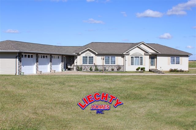 Beautiful and large manufactured home with attached garages